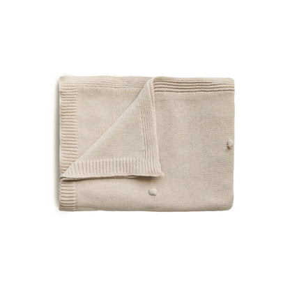 Faltende beige Strickdecke mit gerippten Kanten, Dots Off White Melange
