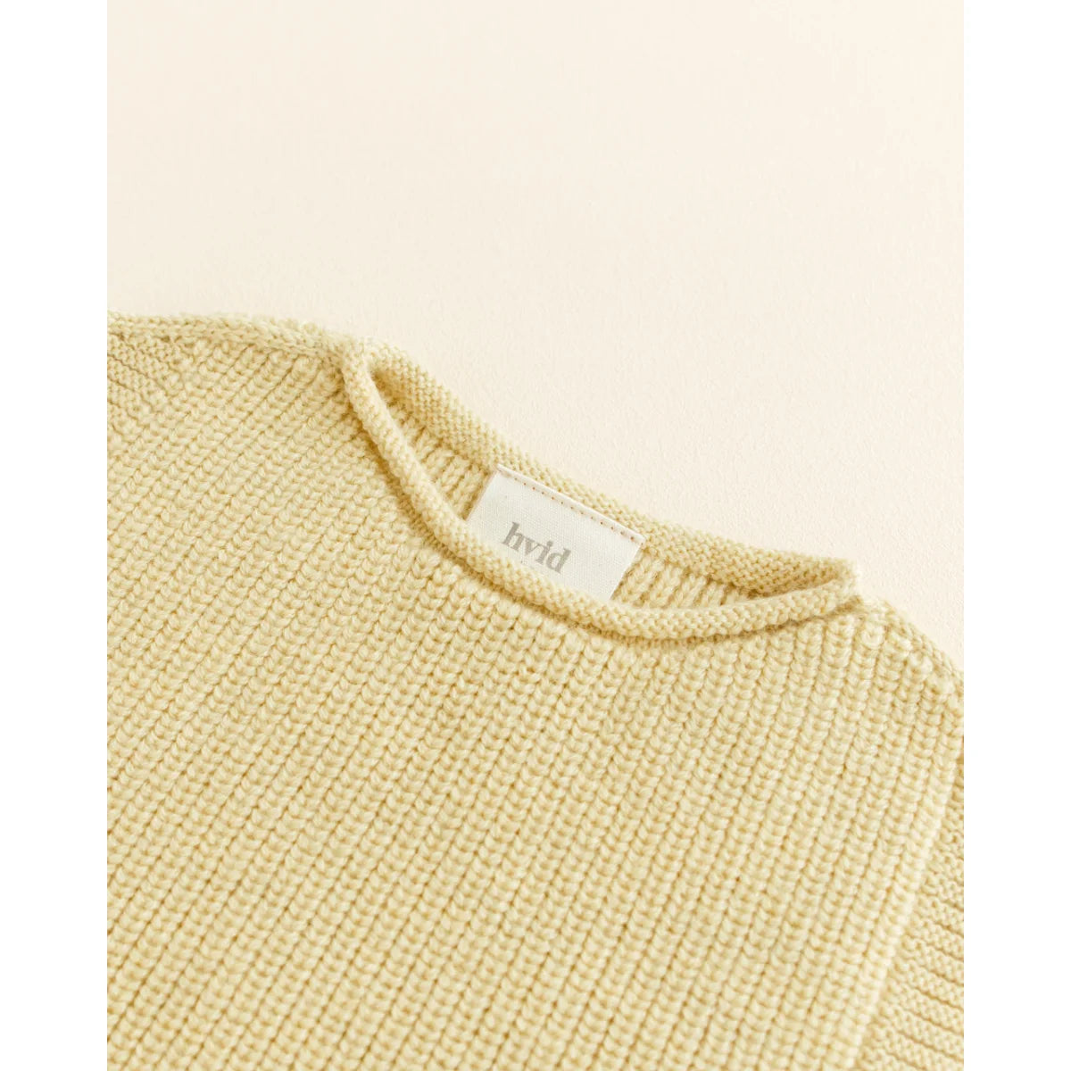 Helle gelbe Strickjacke mit sichtbarem Etikett, Strickpullunder Vest Harvey