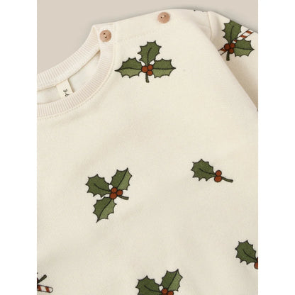 Weißer Baby-Overall mit Mistelblatt- und Beerenmuster aus der Kollektion Sweatshirt | Christmas Holly