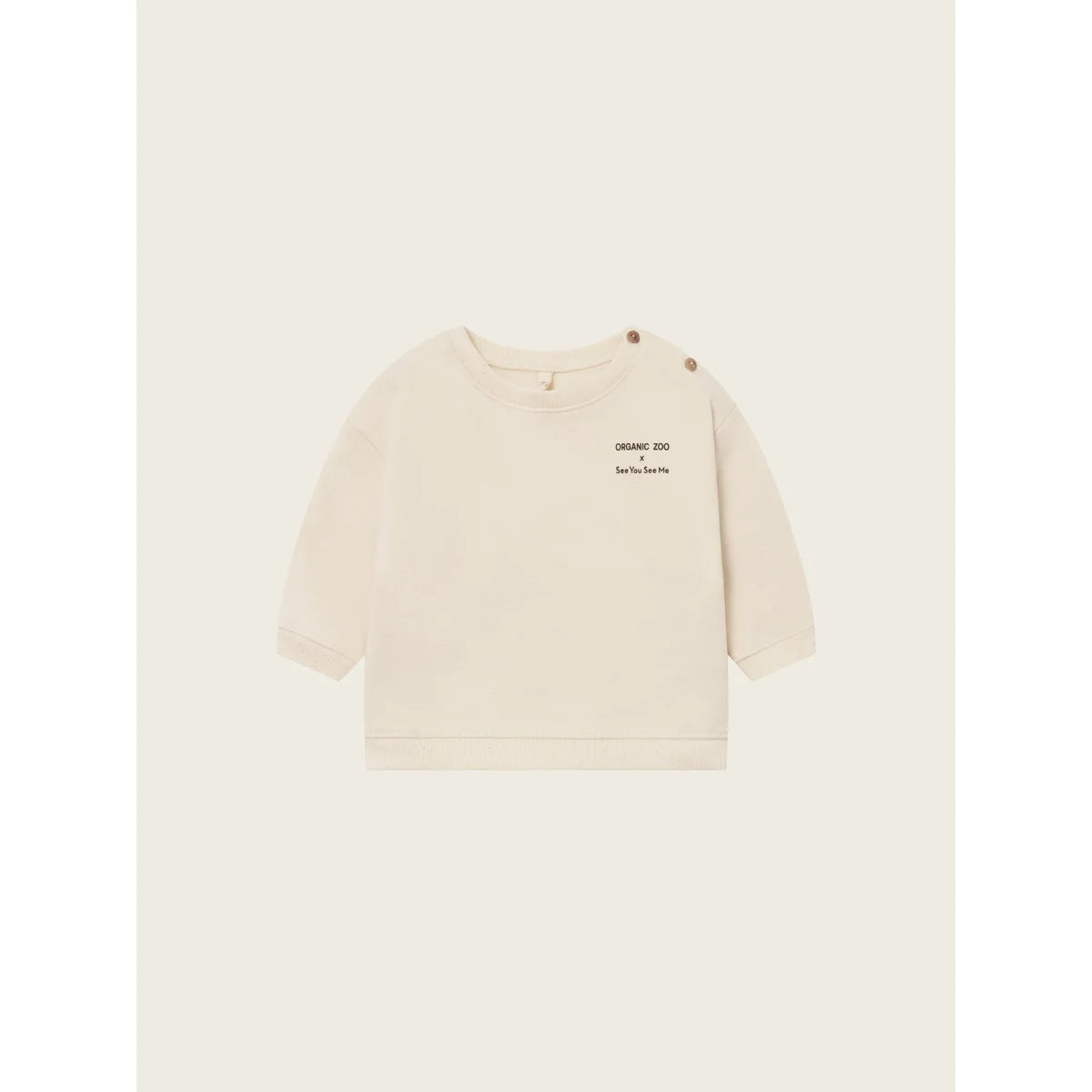 Helles langärmliges Baby-Sweatshirt mit Schulterknöpfen aus der Forest Song Undyed Kollektion