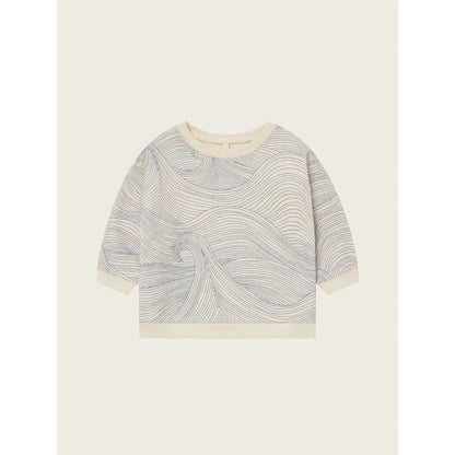 Langärmliges cremefarbenes Sweatshirt mit dunklem grauem Wellenmuster aus dem Produkt Seascape Undyed