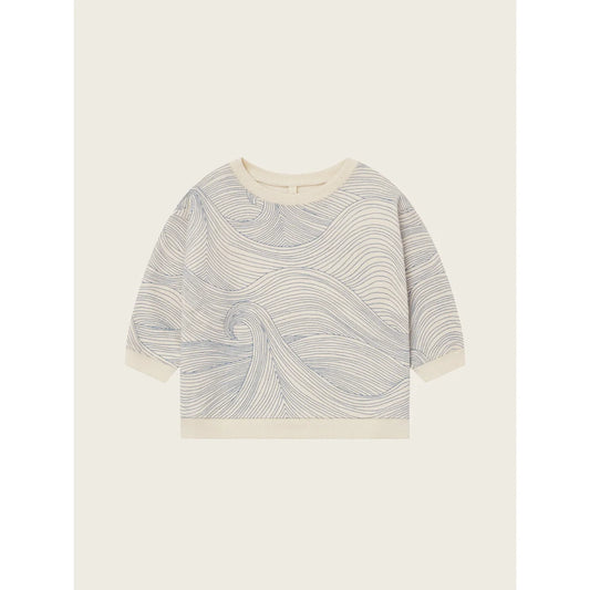 Langärmliges cremefarbenes Sweatshirt mit dunklem grauem Wellenmuster aus dem Produkt Seascape Undyed