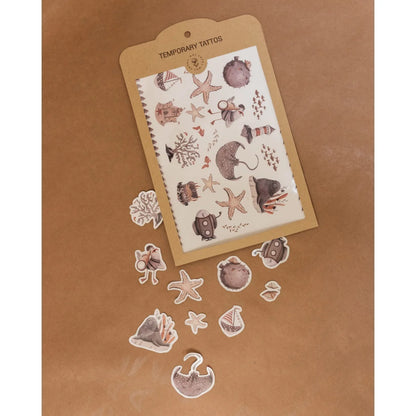 Temporäre Kindertattoos mit Meeresbewohnern und ozeanischen Motiven auf einem Blatt