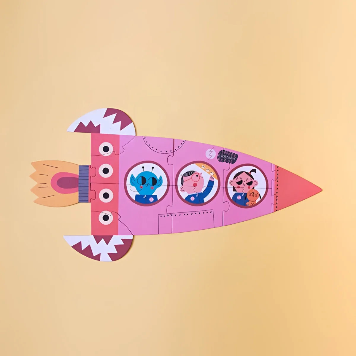 Rosa Cartoon-Rakete mit drei Fensterchen und Charakteren im Valentina in Space Puzzle
