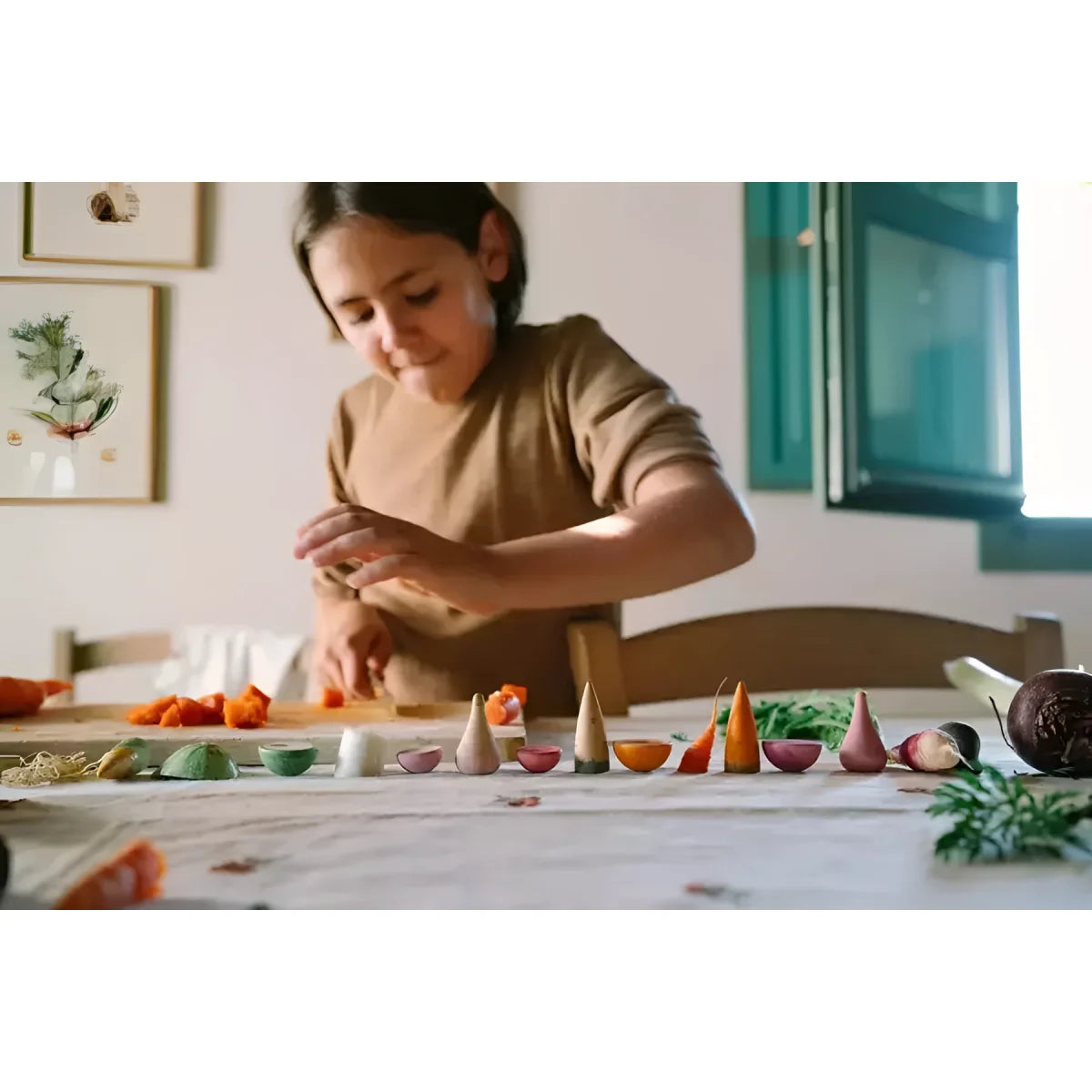 A childs wooden toy vegetable set called veggies with colorful handcrafted pieces in natural wood tones and vibrant hues