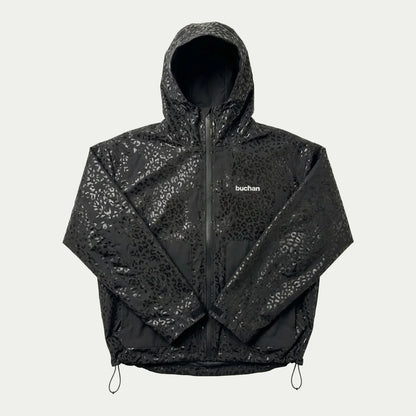 Buchan Water Reactive Cheetah Rain Jacket Schwarz – nass, mit sichtbarem Gepardenmuster
