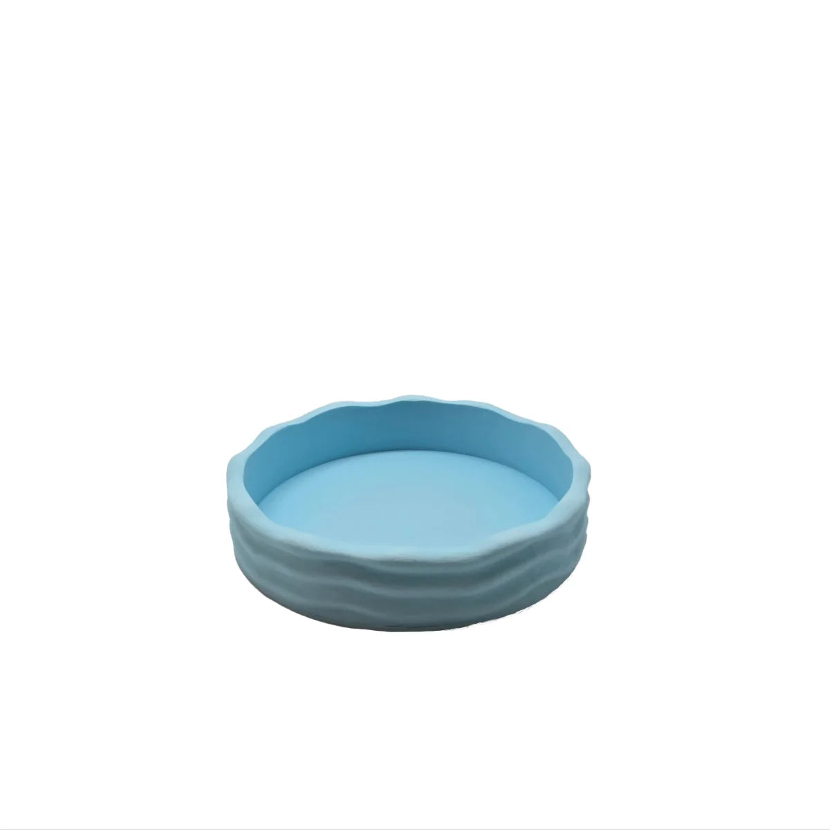 Hellblaue keramische Futternapf mit welligem Rand aus dem Wave Schalen-Set Pastell