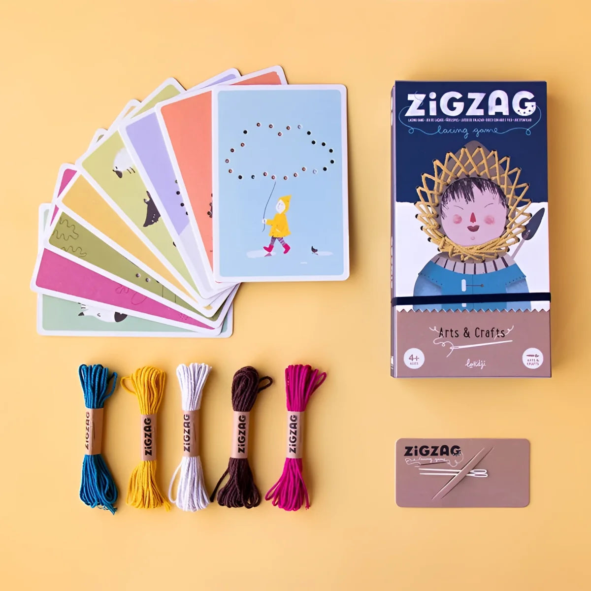 Zig Zag Set: Buntes Zickzack-Rennen mit Karten und Stickgarn